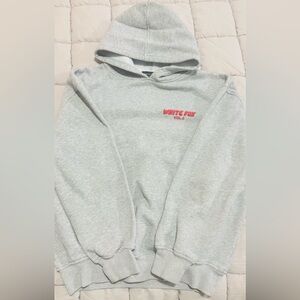 Gray Hoodie with Red Logo. As is on back of hoodie (see image)